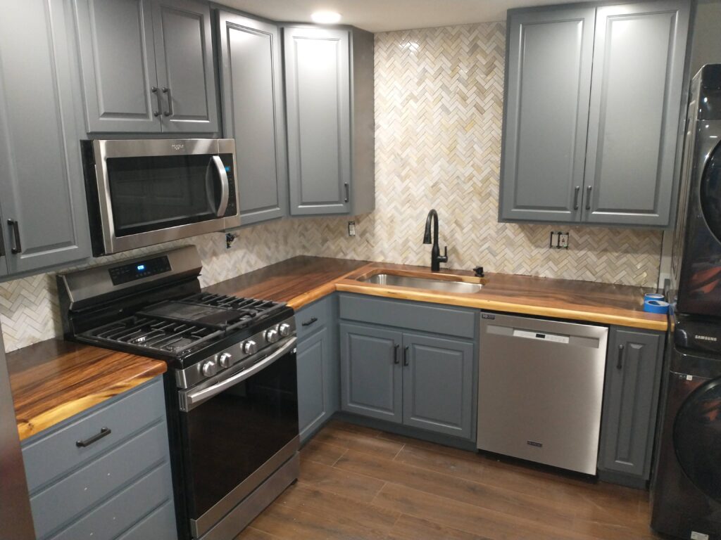 Kitchen Remodel with Blue Cabinets and Wood Countertops